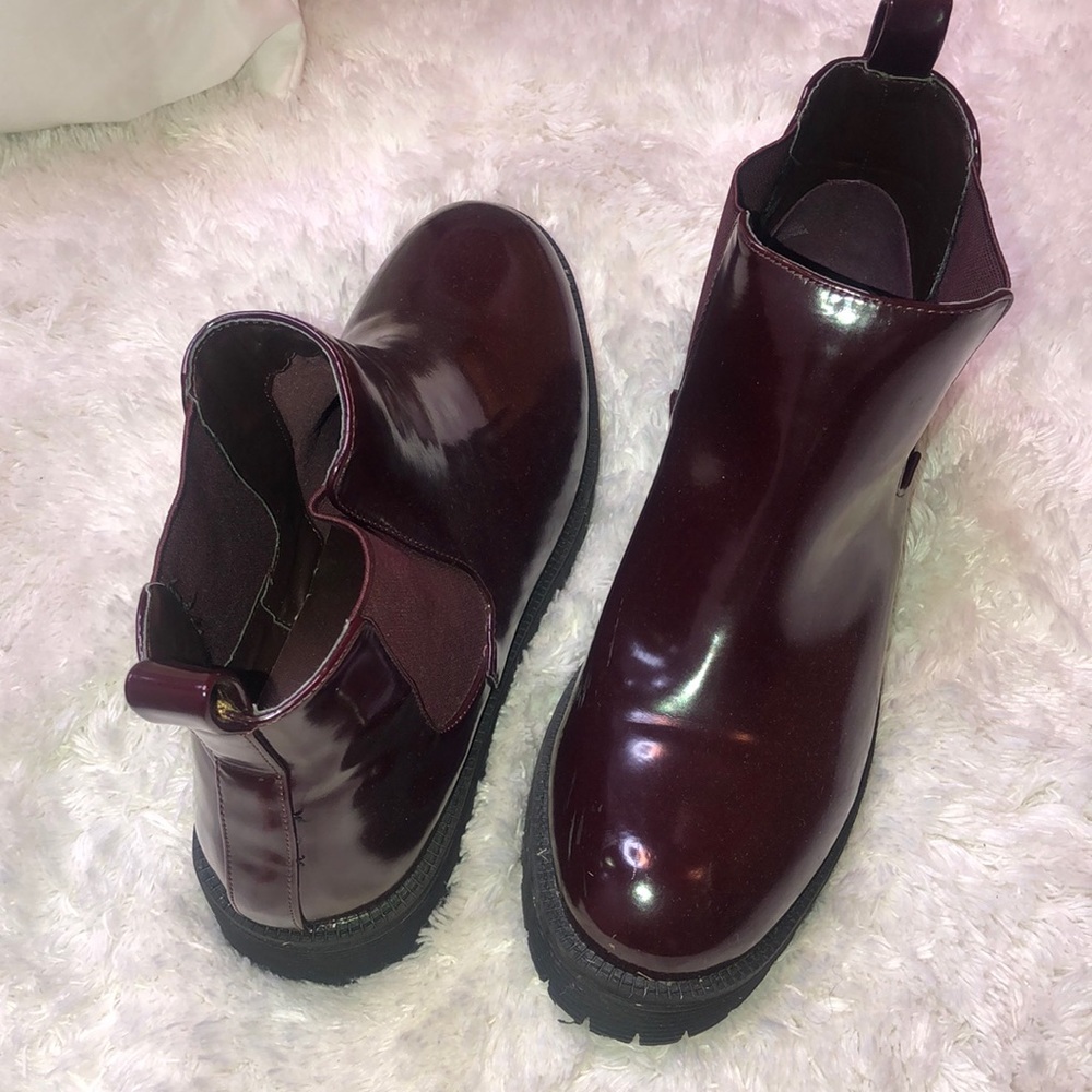 Burgundy ankle boots.